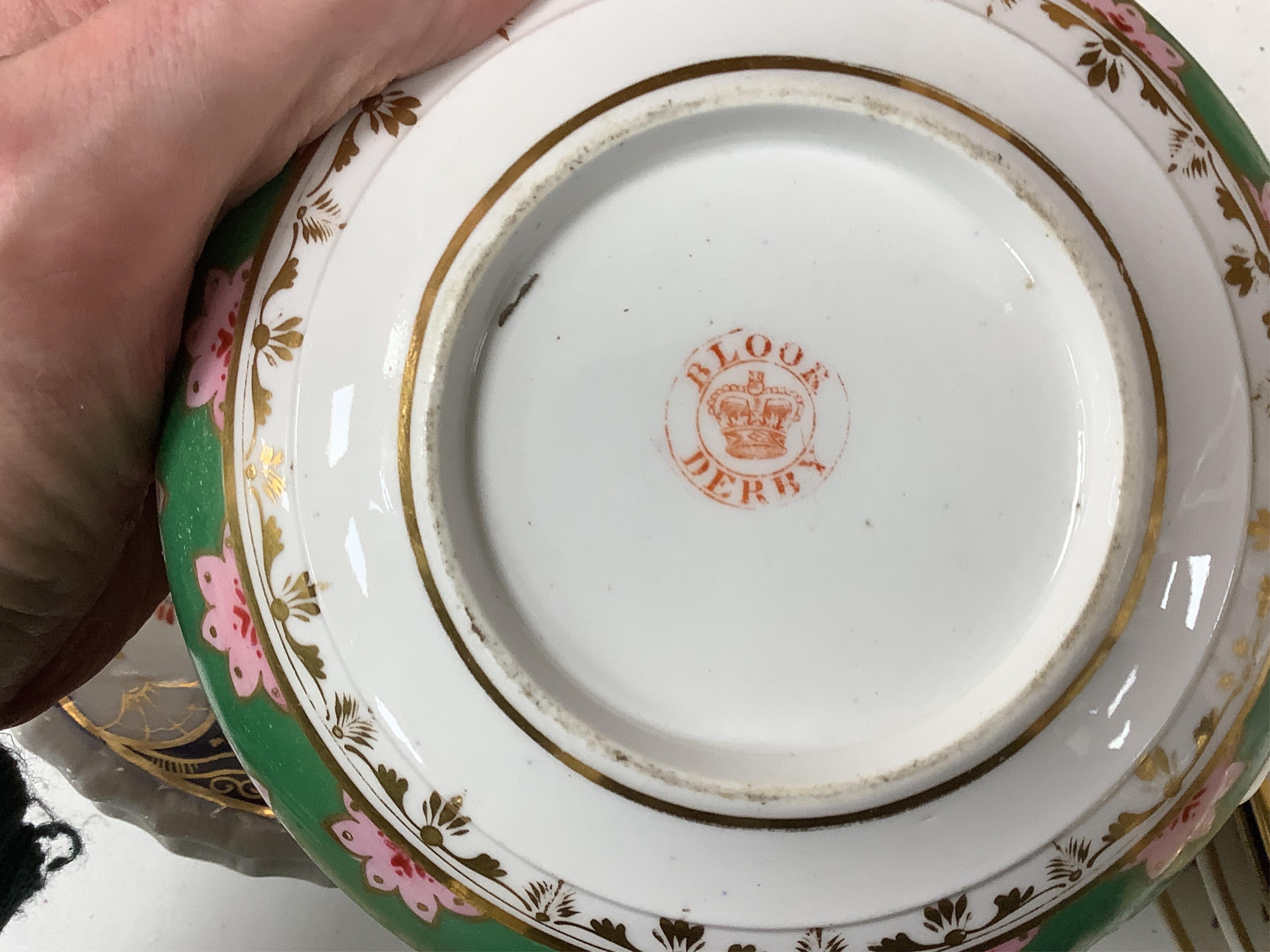 A collection of early 19th century English porcelain tea, dessert and dinner wares including Derby dessert plates, Bloor Derby, Barr Flight & Barr plate, Spode, Coalport etc.